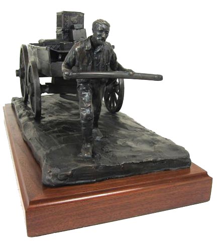 Man pulling 1800's Buckboard Wagon bronze statue 1