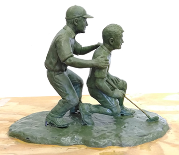 Two Golfers Young and Older Statue